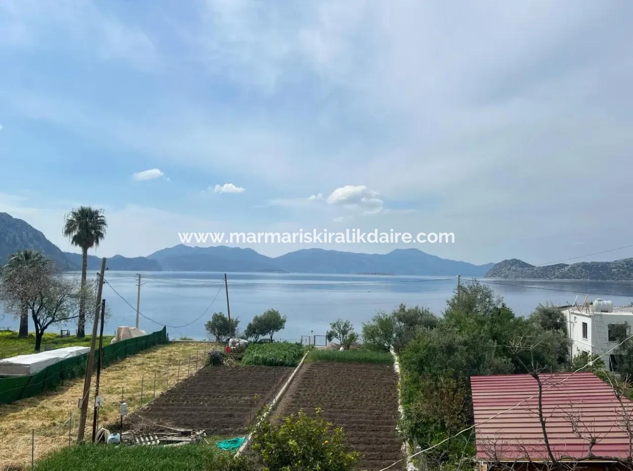 Einfamilienhaus Zum Verkauf Auf Einem 2000M2 Großen Grundstück Am Meer Im Viertel Marmaris Söğüt. Geeignet Zum Festbinden Eines Bootes Davor.