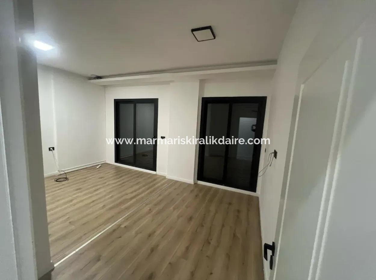 Luxuswohnung Zum Verkauf In Einem Stilvollen Komplex Im Zentrum Von Marmaris, Mit Erdgeschoss, Garten, 3 Zimmern, 1 Wohnzimmer, Parkplatz