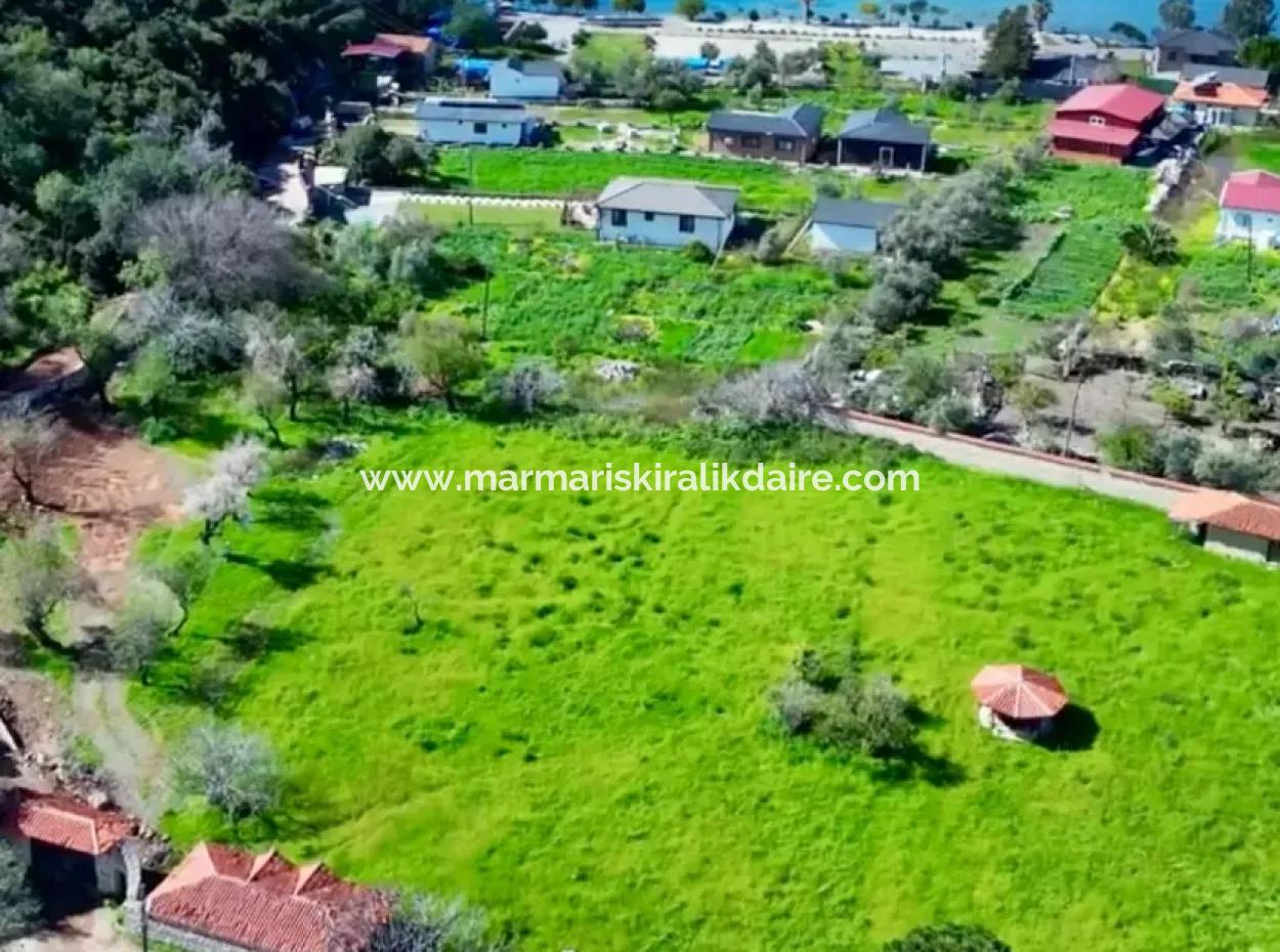 Grundstück Zum Verkauf Im Dorf Söğüt Im Bezirk Marmaris, 150 Meter Zum Meer, 10000M2. Er Kann Als Camping-, Wohnwagen-Campingbereich Im Tourismusbereich Genutzt Werden.
