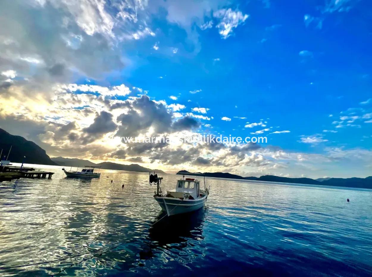 Marmaris Söğüt Mahallesi Denize Sıfır 2000M2 Arsa Satılık Müstakil Ev.önüne Tekne Bağlamaya Uygun.